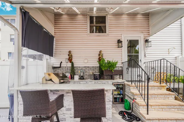 a view of a back yard of the house