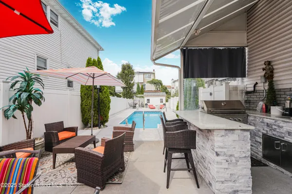 a view of a house with a swimming pool