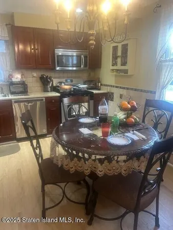 a view of a dining room with furniture