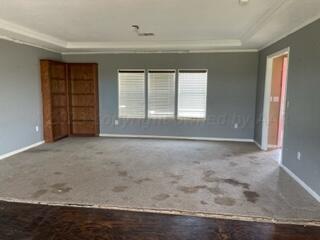 323 County Road 305 Panhandle, TX 79068 - Photo 13 of 23 a view of an empty room with a window and closet