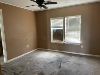 323 County Road 305 Panhandle, TX 79068 - Photo 16 of 23 a view of an empty room with a window