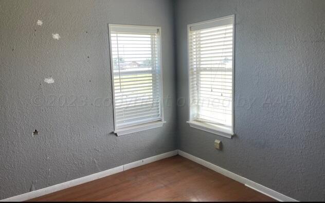 323 County Road 305 Panhandle, TX 79068 - Photo 17 of 23 a view of an empty room with a window