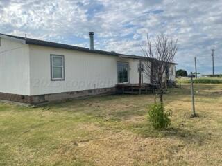 323 County Road 305 Panhandle, TX 79068 - Photo 5 of 23 a view of a backyard