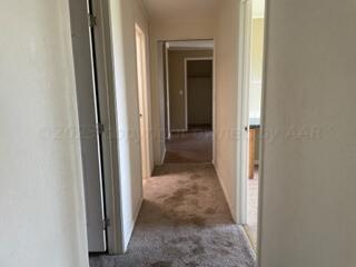 323 County Road 305 Panhandle, TX 79068 - Photo 9 of 23 a view of a hallway with a hallway
