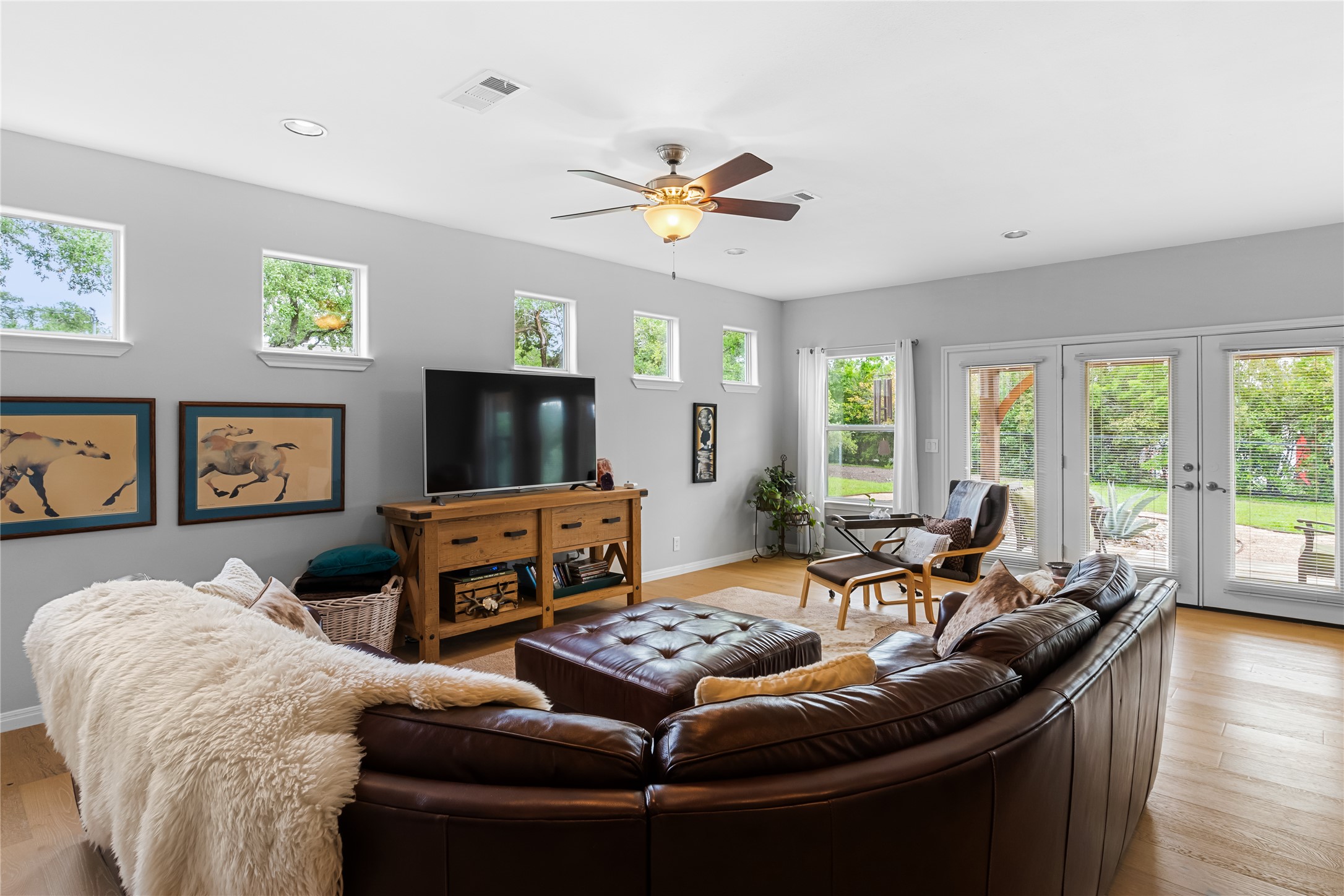5500 Sunset Ridge, Unit A & B Austin, TX 78735 - Photo 11 of 32 a living room with furniture and a flat screen tv