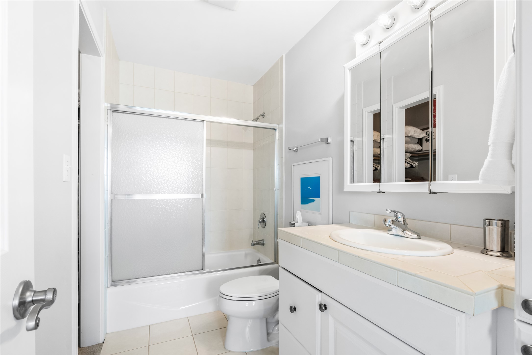 5500 Sunset Ridge, Unit A & B Austin, TX 78735 - Photo 19 of 32 a bathroom with a sink toilet and shower