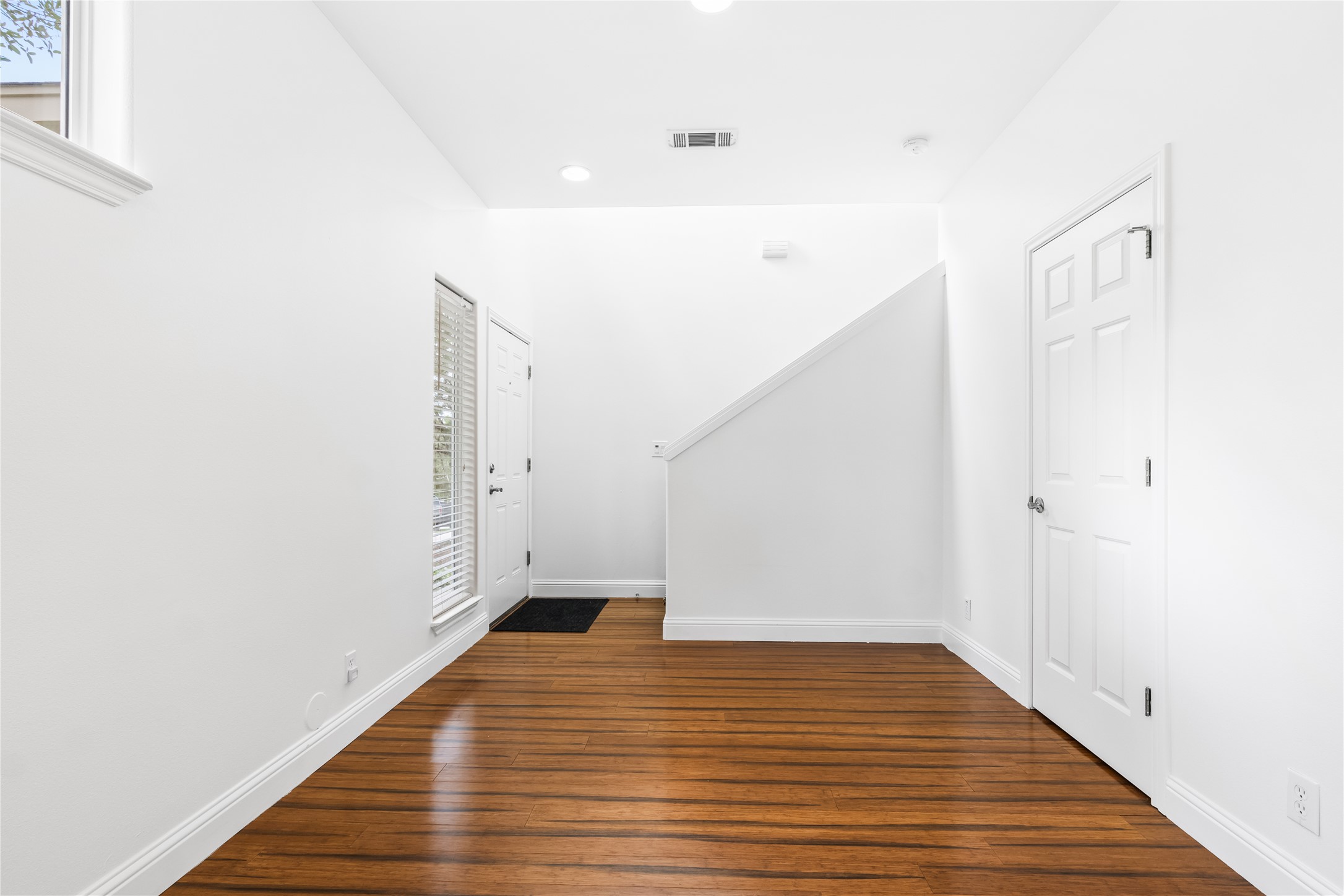 5500 Sunset Ridge, Unit A & B Austin, TX 78735 - Photo 23 of 32 a view of an empty room with wooden floor