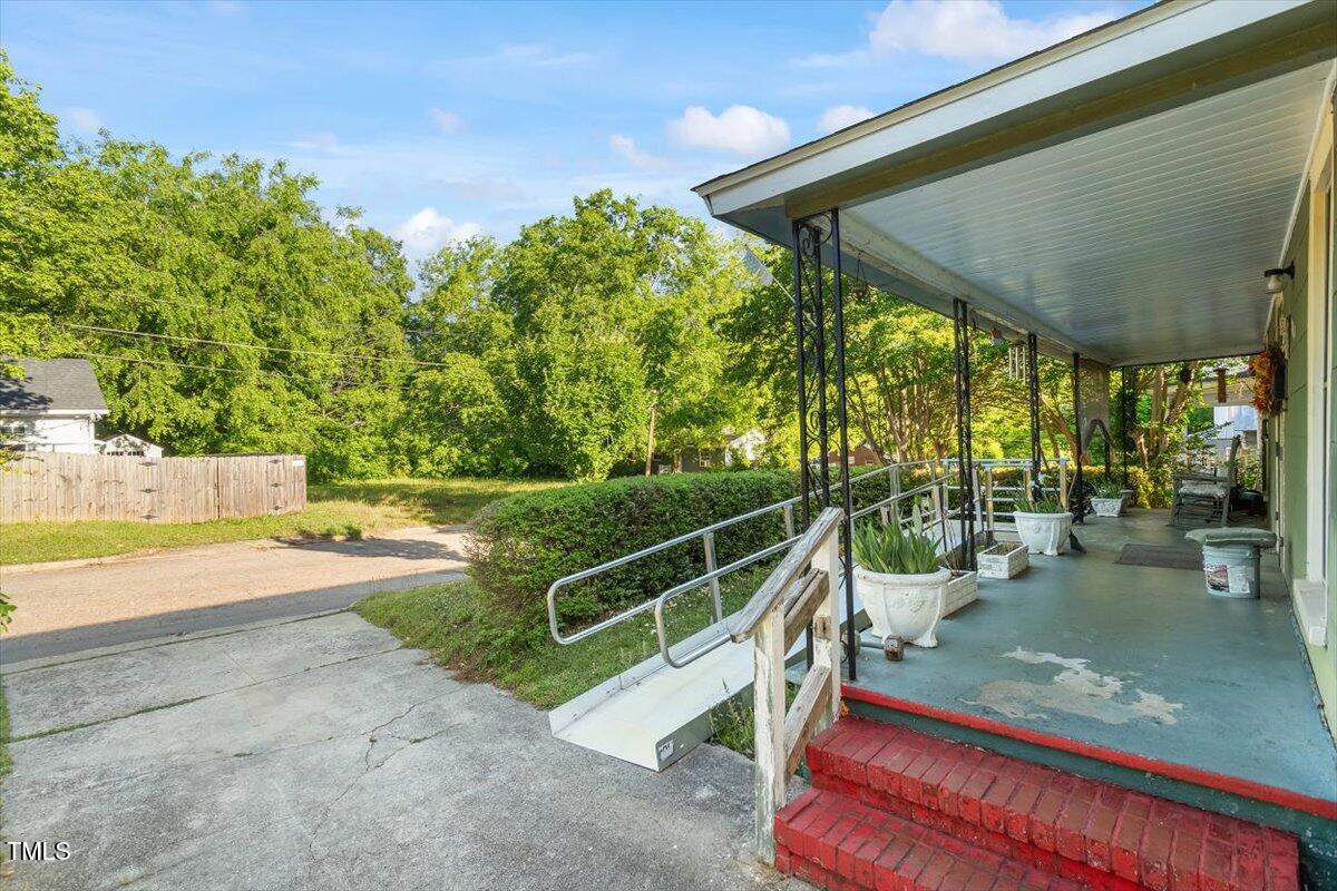 204 Heck Street Raleigh, NC 27601 - Photo 3 of 13 a view of a swimming pool with a patio and backyard