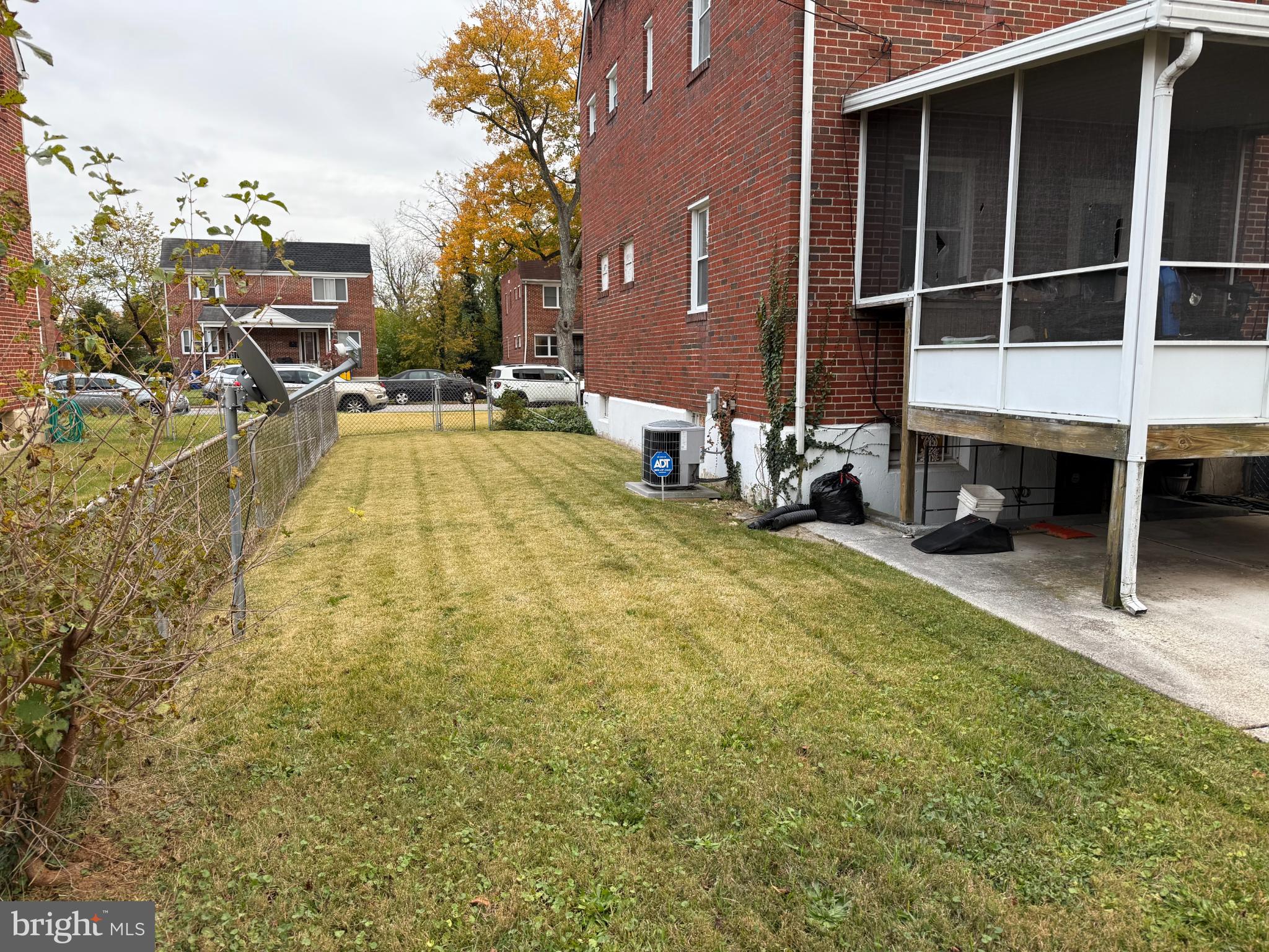 3720 Bartwood Road Baltimore, MD 21215 - Photo 2 of 8 a swimming pool with outdoor seating and yard