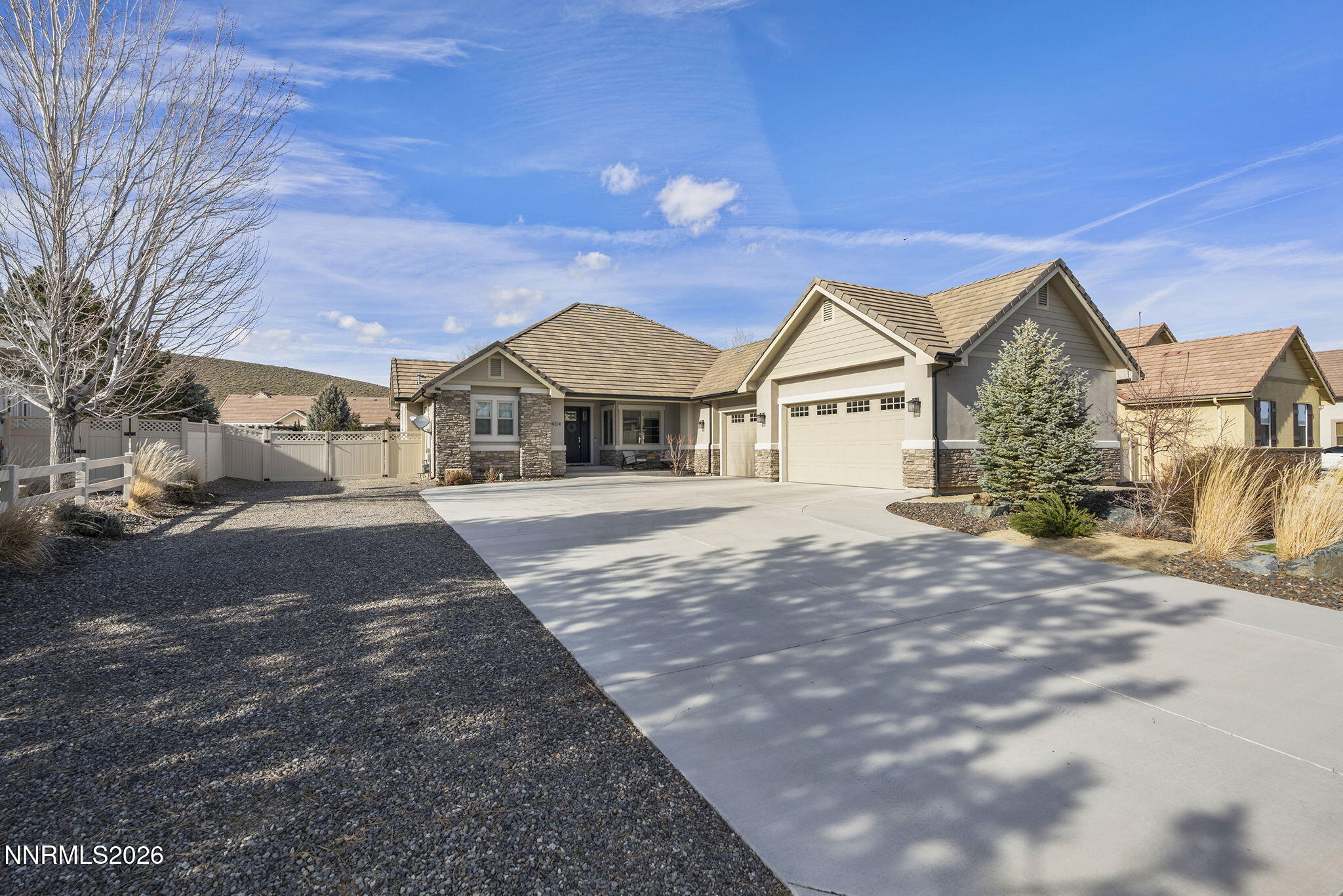 404 Chianti Way Dayton, NV 89403 - Photo 1 of 42 a front view of a house with a yard