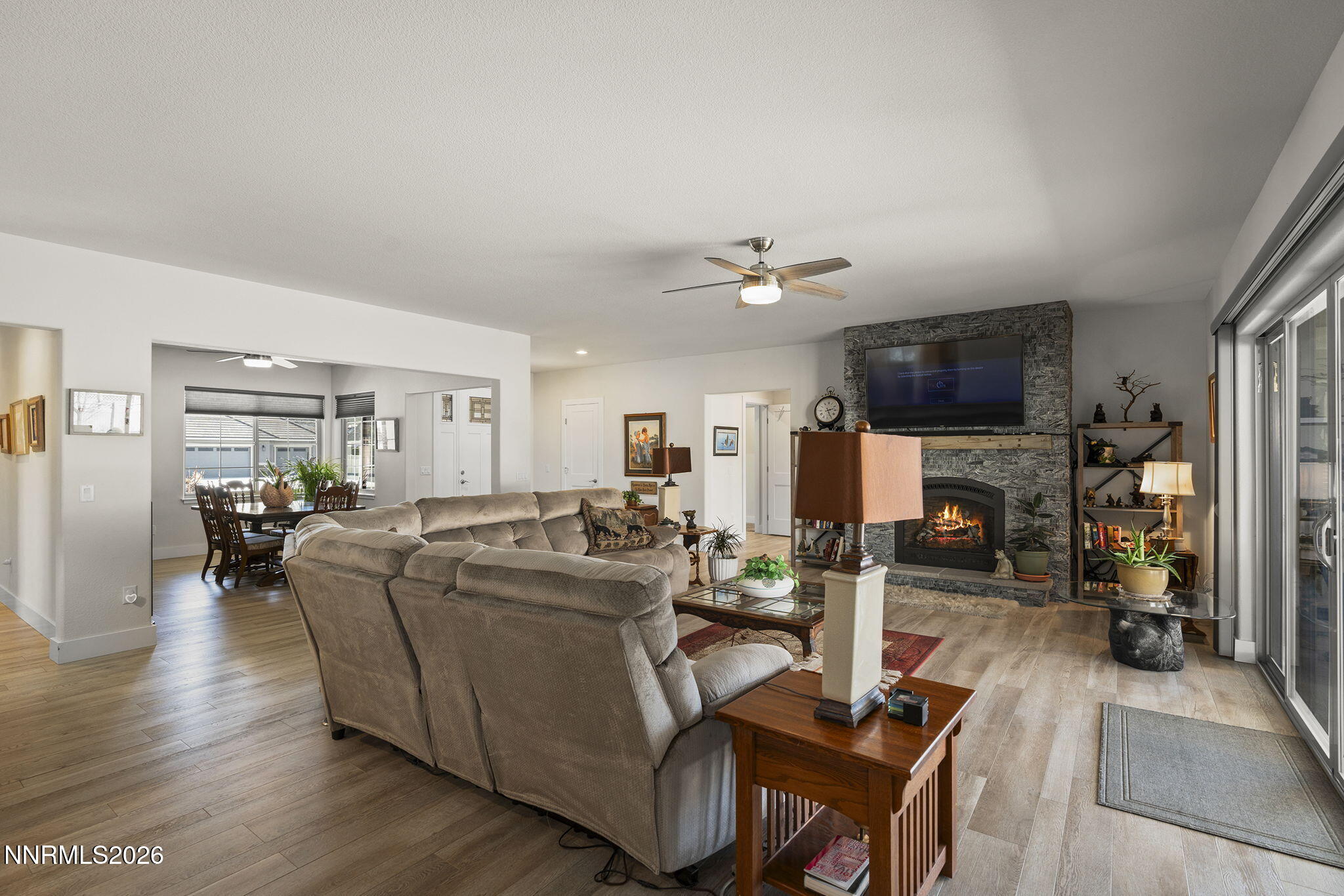 404 Chianti Way Dayton, NV 89403 - Photo 13 of 42 a living room with furniture and a flat screen tv