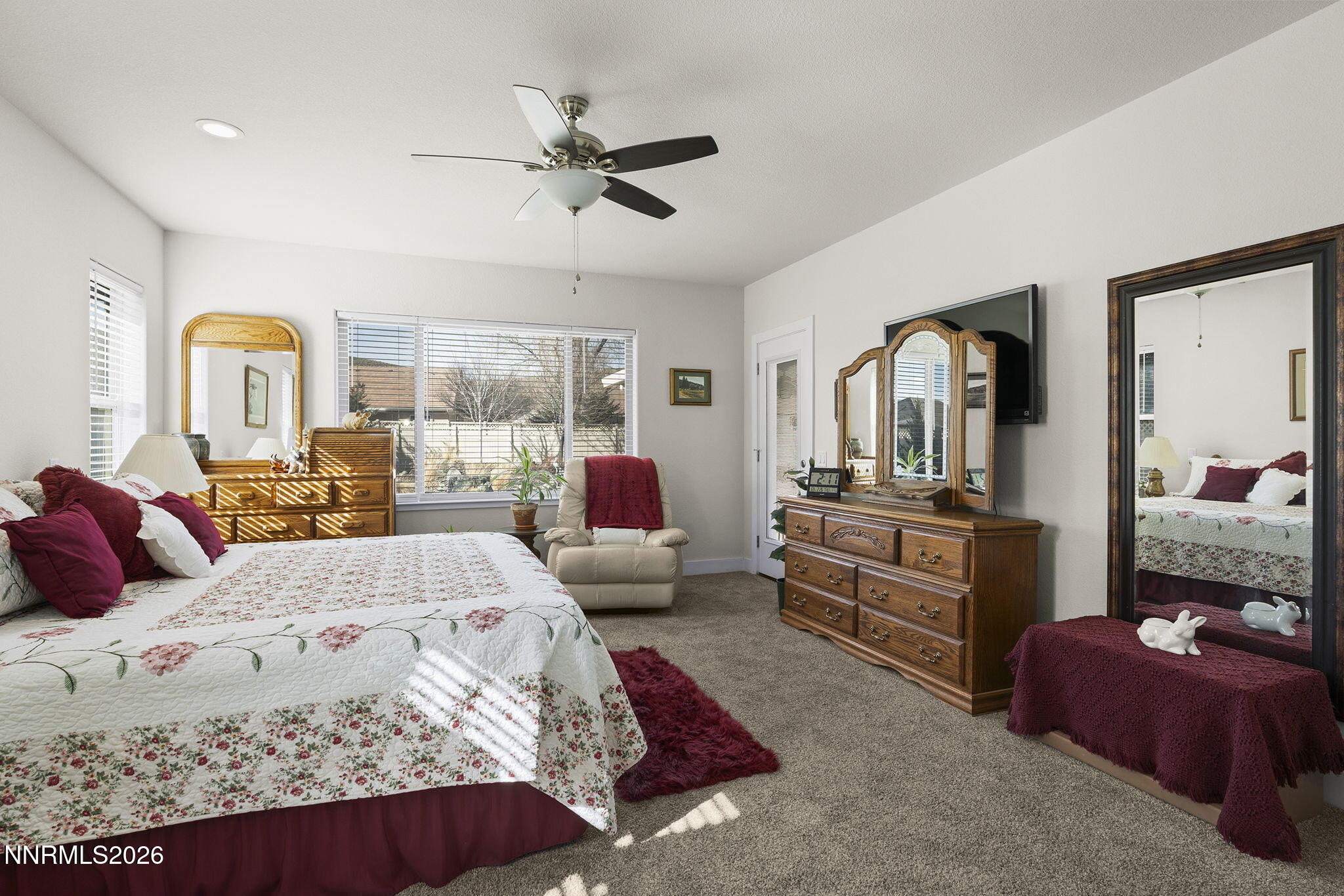 404 Chianti Way Dayton, NV 89403 - Photo 21 of 42 a bedroom with a bed and furniture