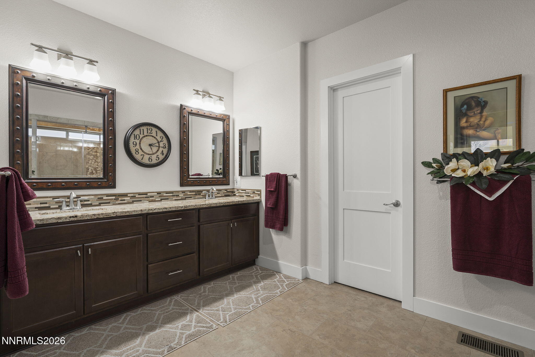 404 Chianti Way Dayton, NV 89403 - Photo 23 of 42 a spacious bathroom with a granite countertop sink and a large mirror