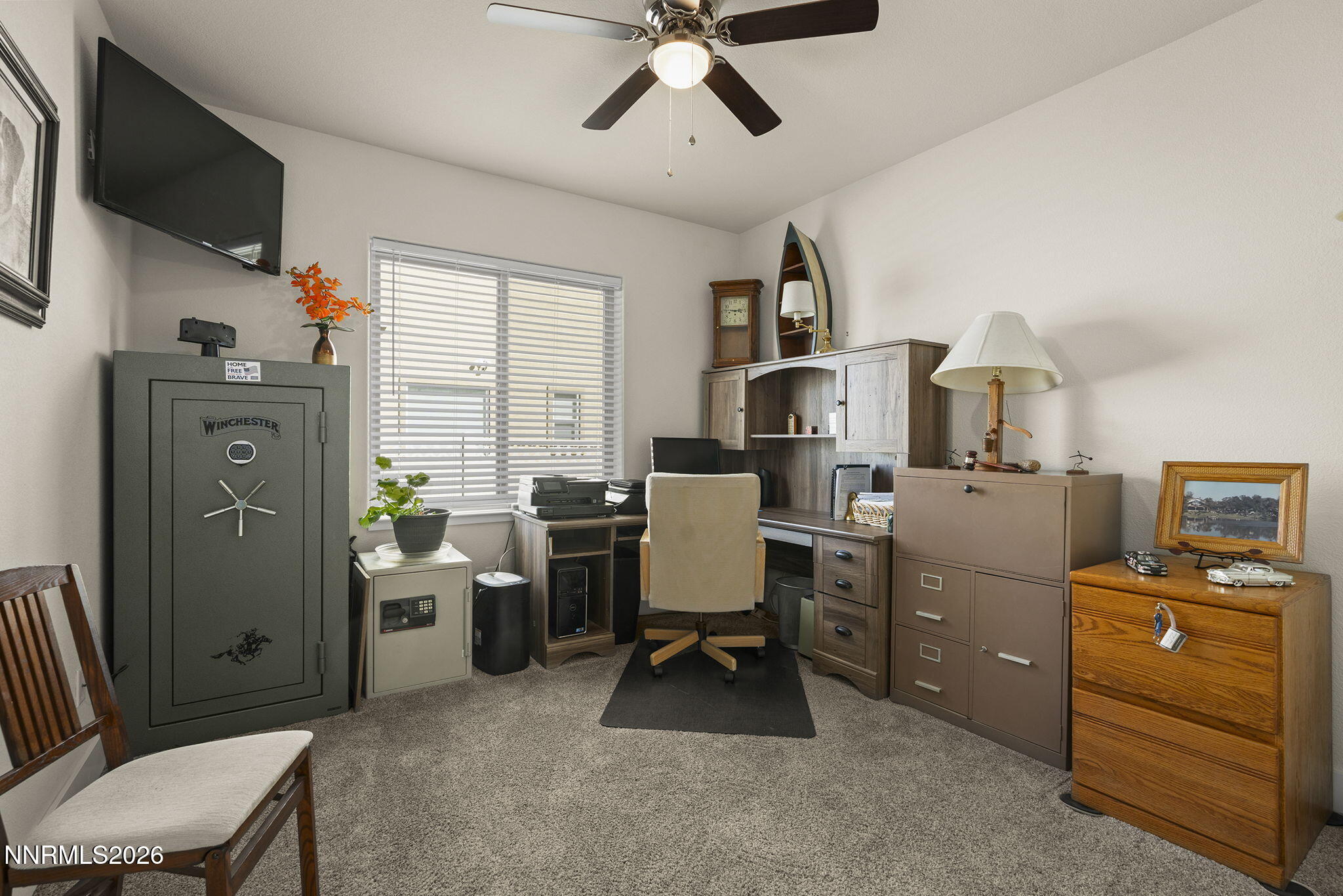 404 Chianti Way Dayton, NV 89403 - Photo 26 of 42 a view of a workspace with furniture and a window