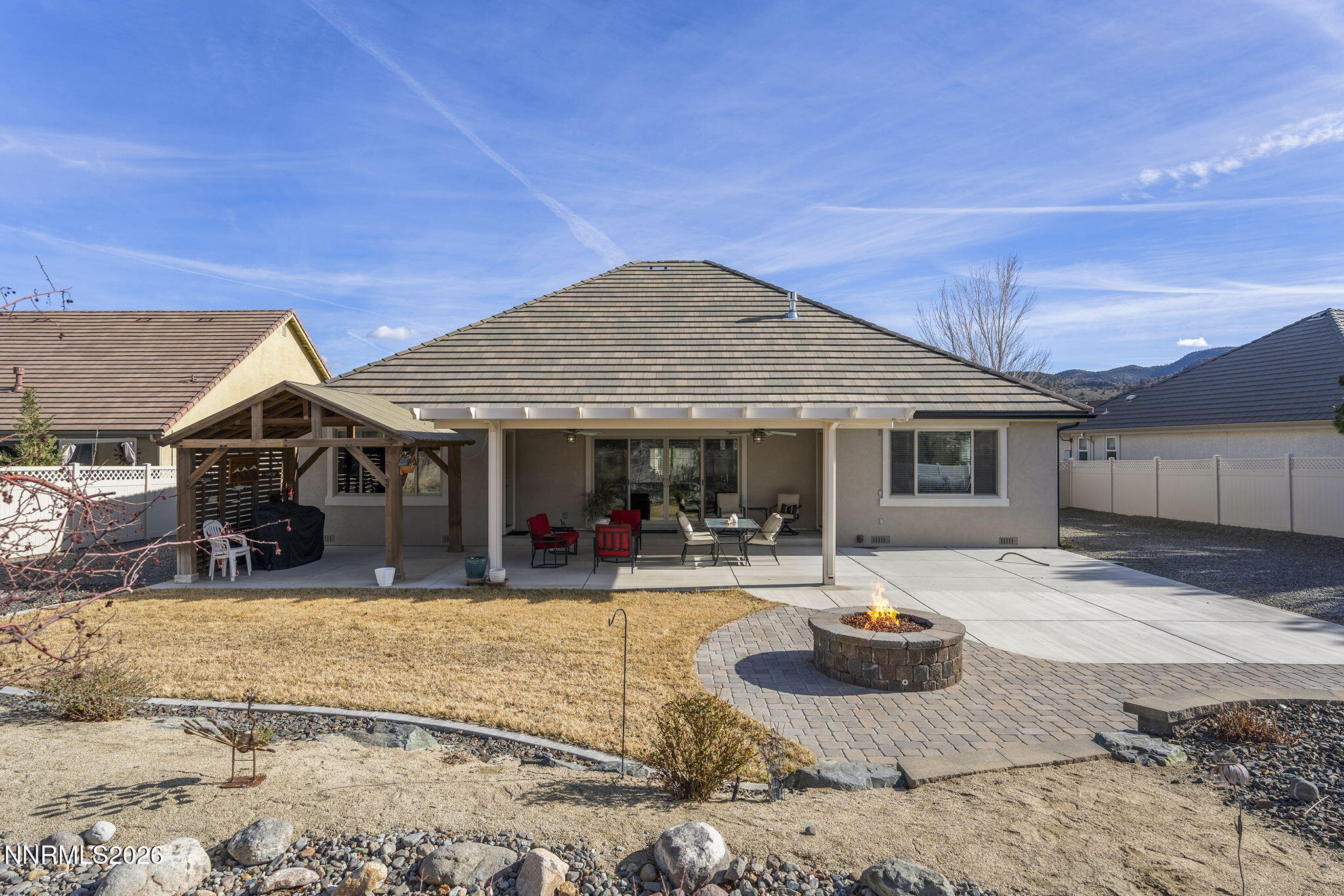 404 Chianti Way Dayton, NV 89403 - Photo 32 of 42 a swimming pool with outdoor seating and yard