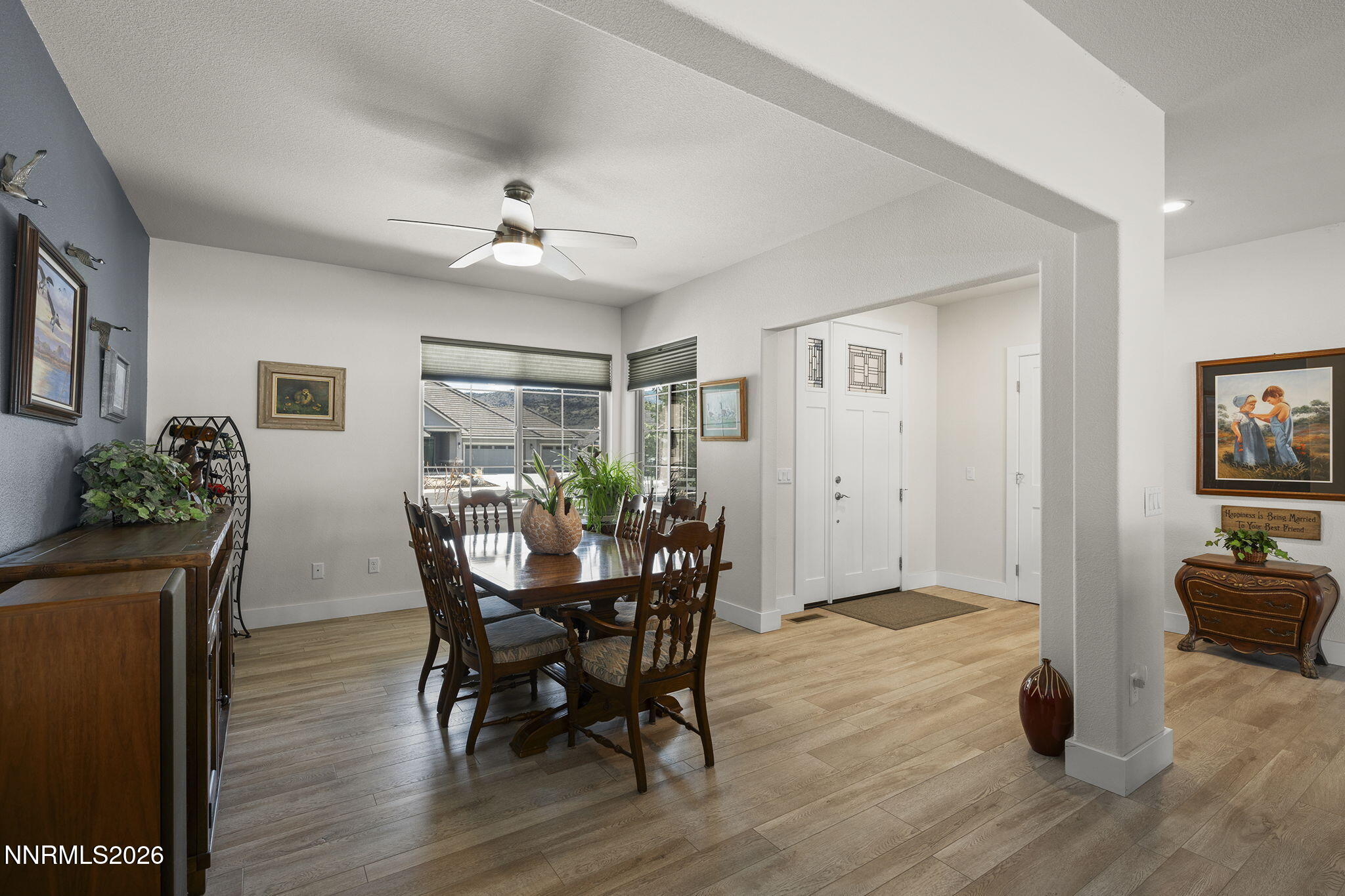 404 Chianti Way Dayton, NV 89403 - Photo 9 of 42 a view of a dining room with furniture and wooden floor