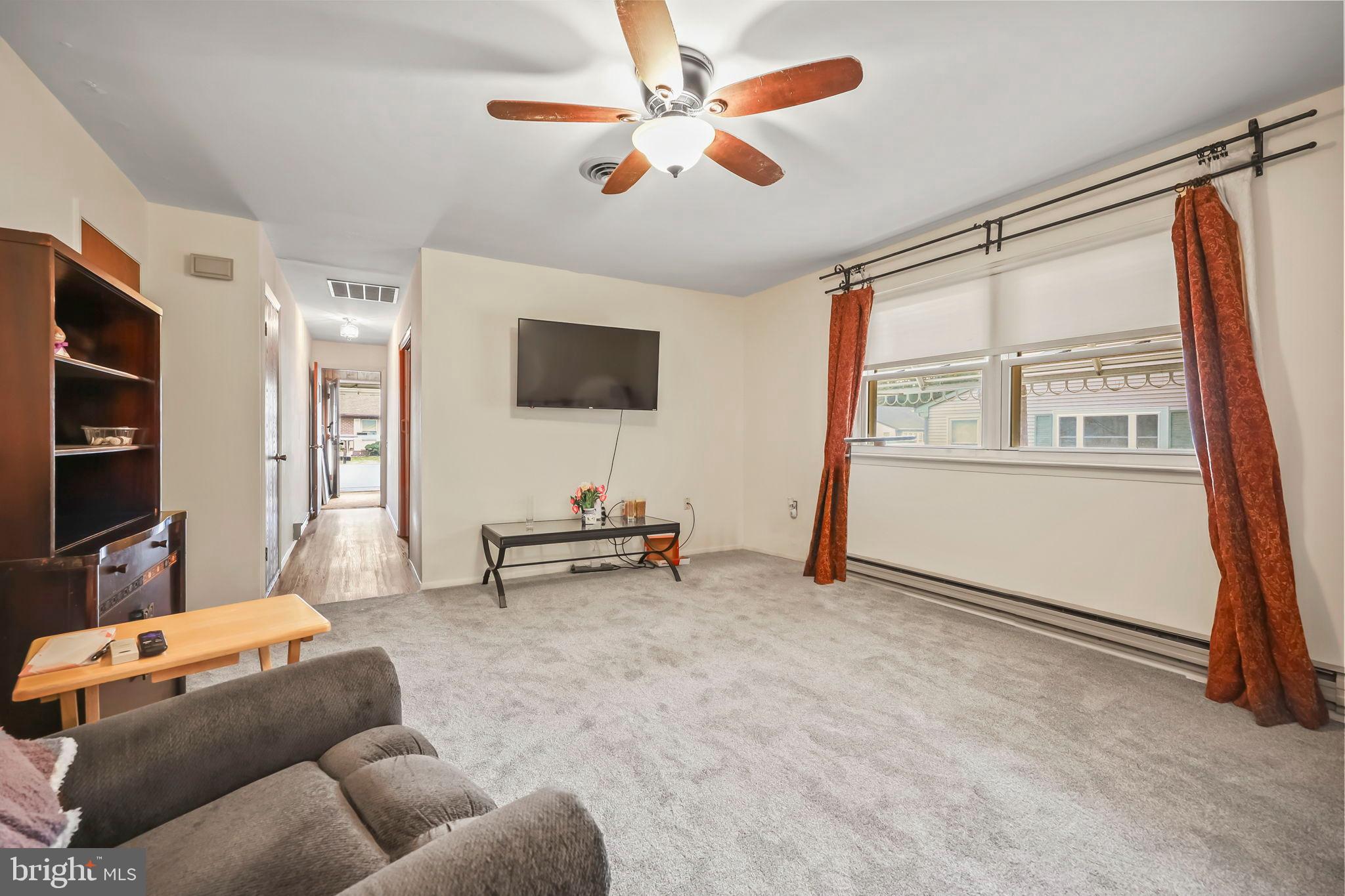 153B Sunset Road Whiting, NJ 08759 - Photo 5 of 19 a living room with furniture and a flat screen tv