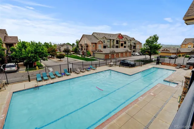 a view of a house with outdoor space and sitting area