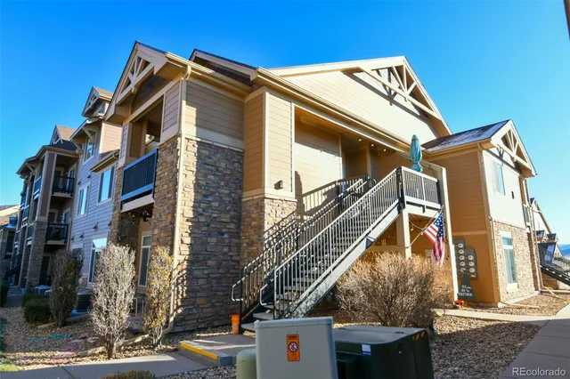 a view of a house with a street