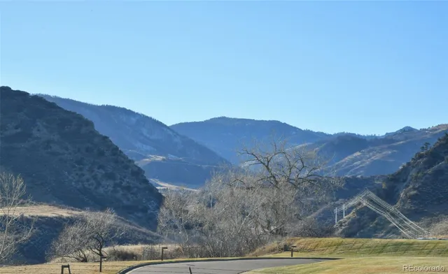 a view of a house with a mountain
