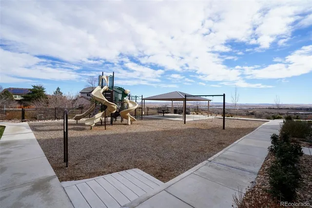 a view of a terrace with sitting area