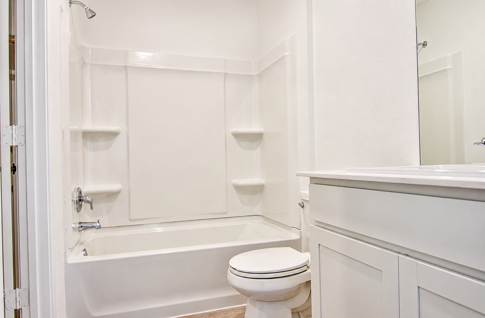 397 Keefer Kyle, TX 78640 - Photo 16 of 33 A well-appointed bath features a sleek vanity and a combined shower-tub unit.