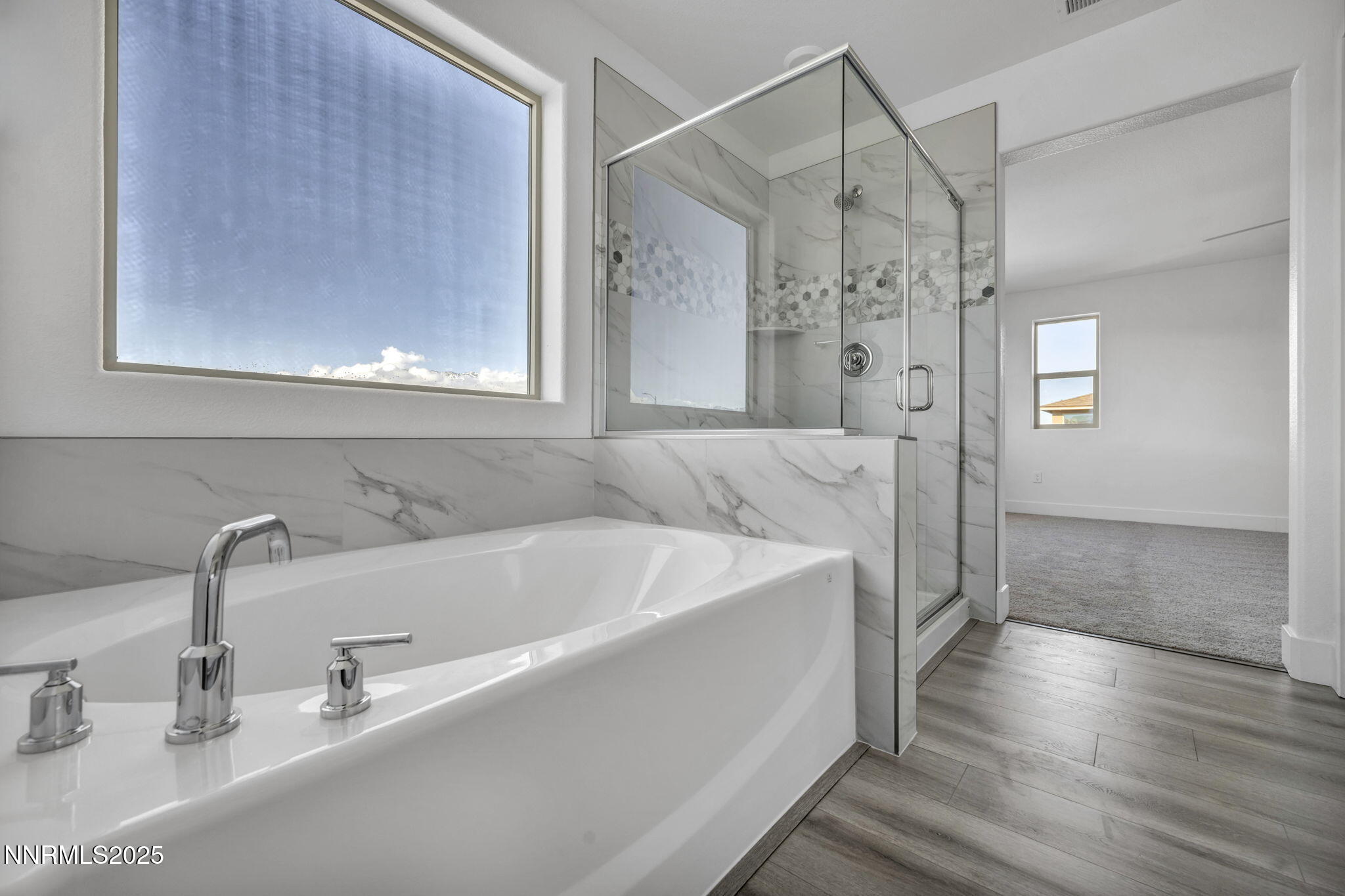 1310 Nebula Road, Unit HOMESITE 90 Carson City, NV 89705 - Photo 11 of 17 a bathroom with a tub and a sink