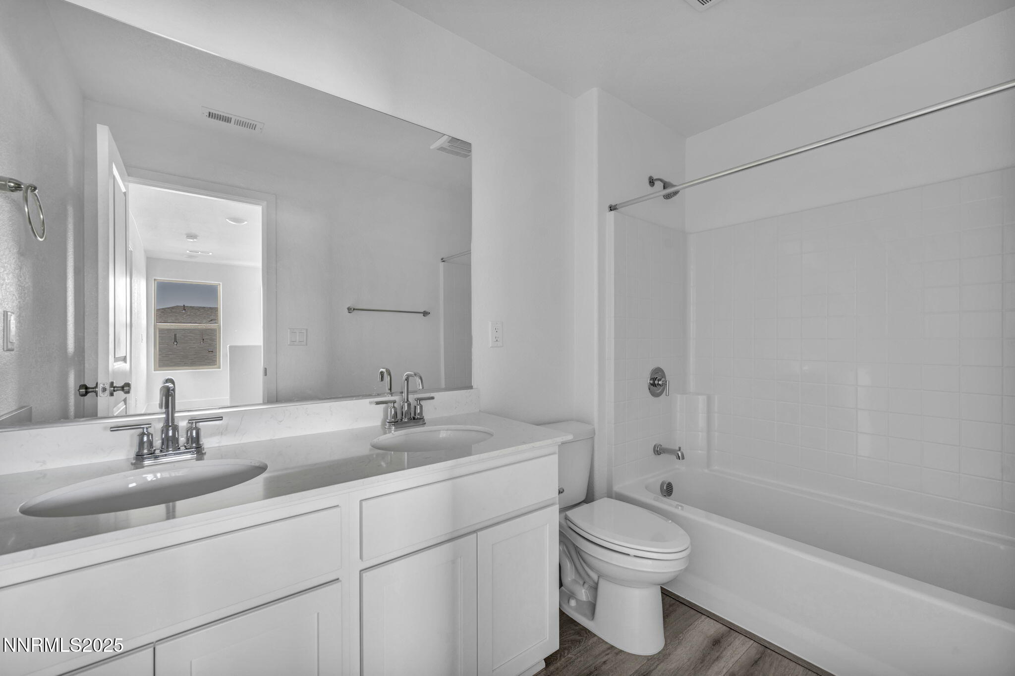 1310 Nebula Road, Unit HOMESITE 90 Carson City, NV 89705 - Photo 14 of 17 a bathroom with a sink a toilet and shower
