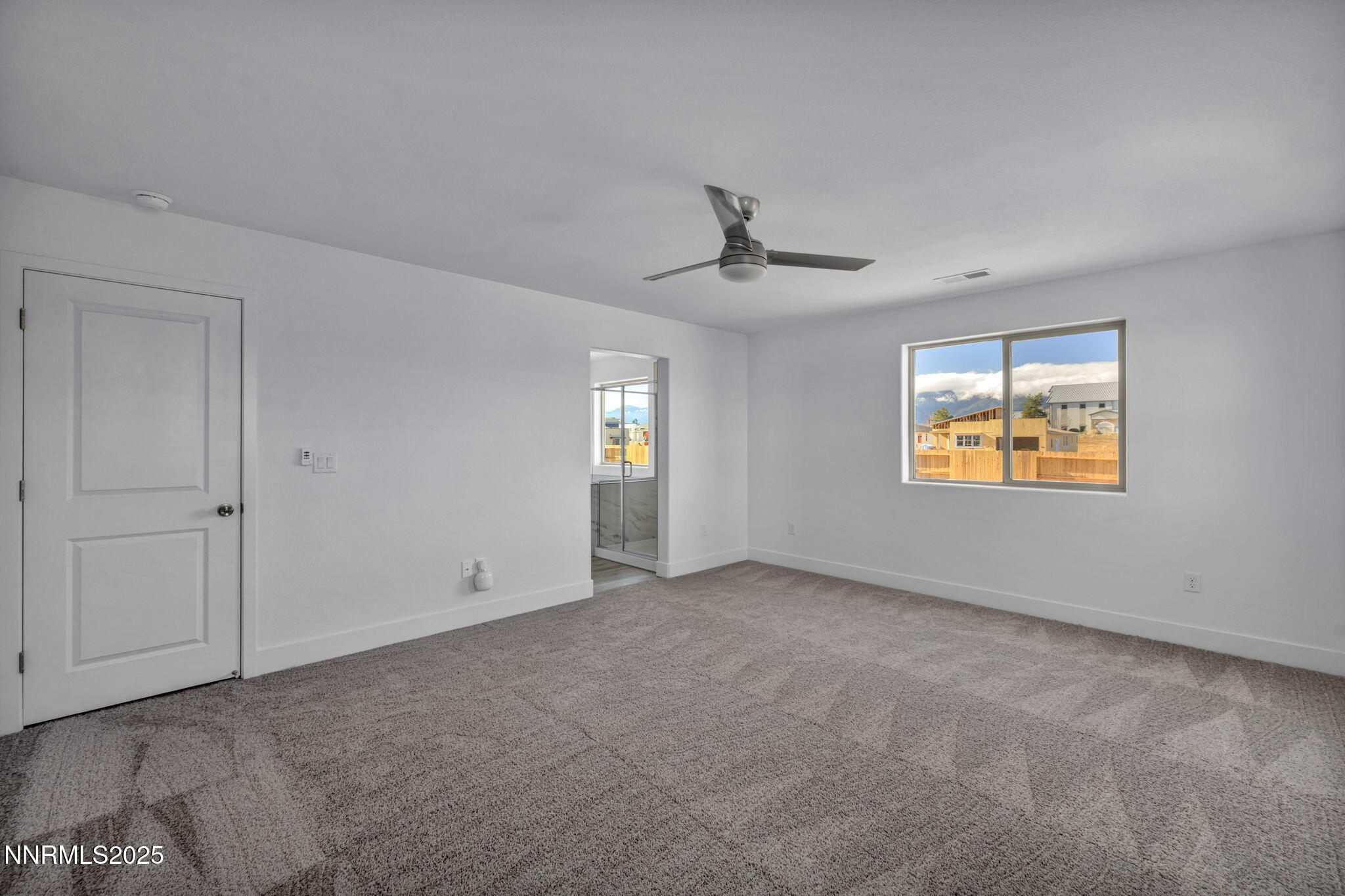 1310 Nebula Road, Unit HOMESITE 90 Carson City, NV 89705 - Photo 8 of 17 a view of an empty room with a window