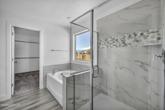 a bathroom with a sink and shower