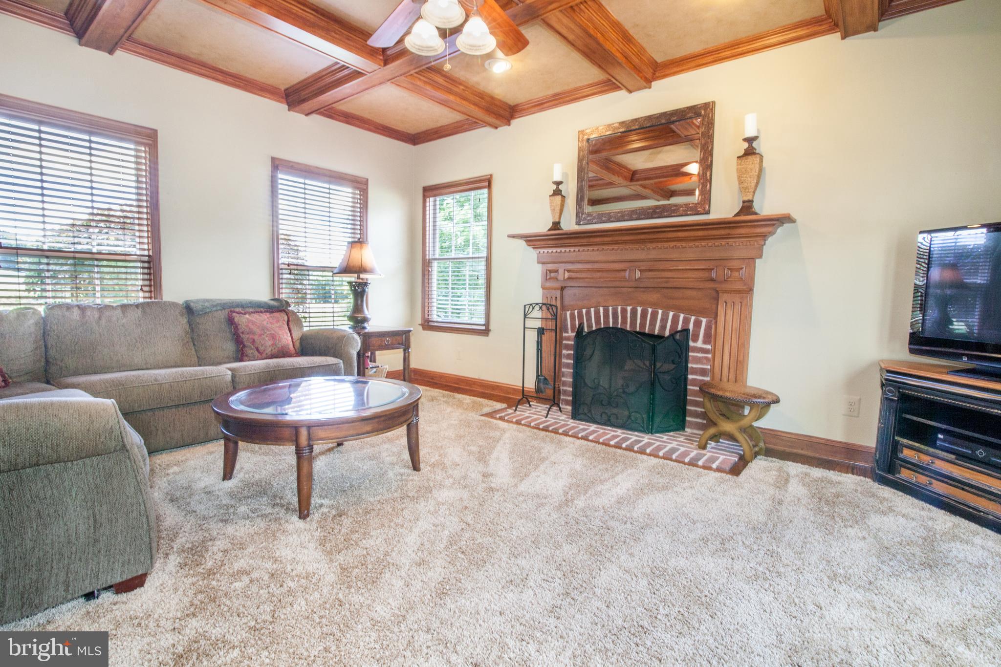 3925 Davis Corner Road Street, MD 21154 - Photo 20 of 51 Family room with woodburning fireplace