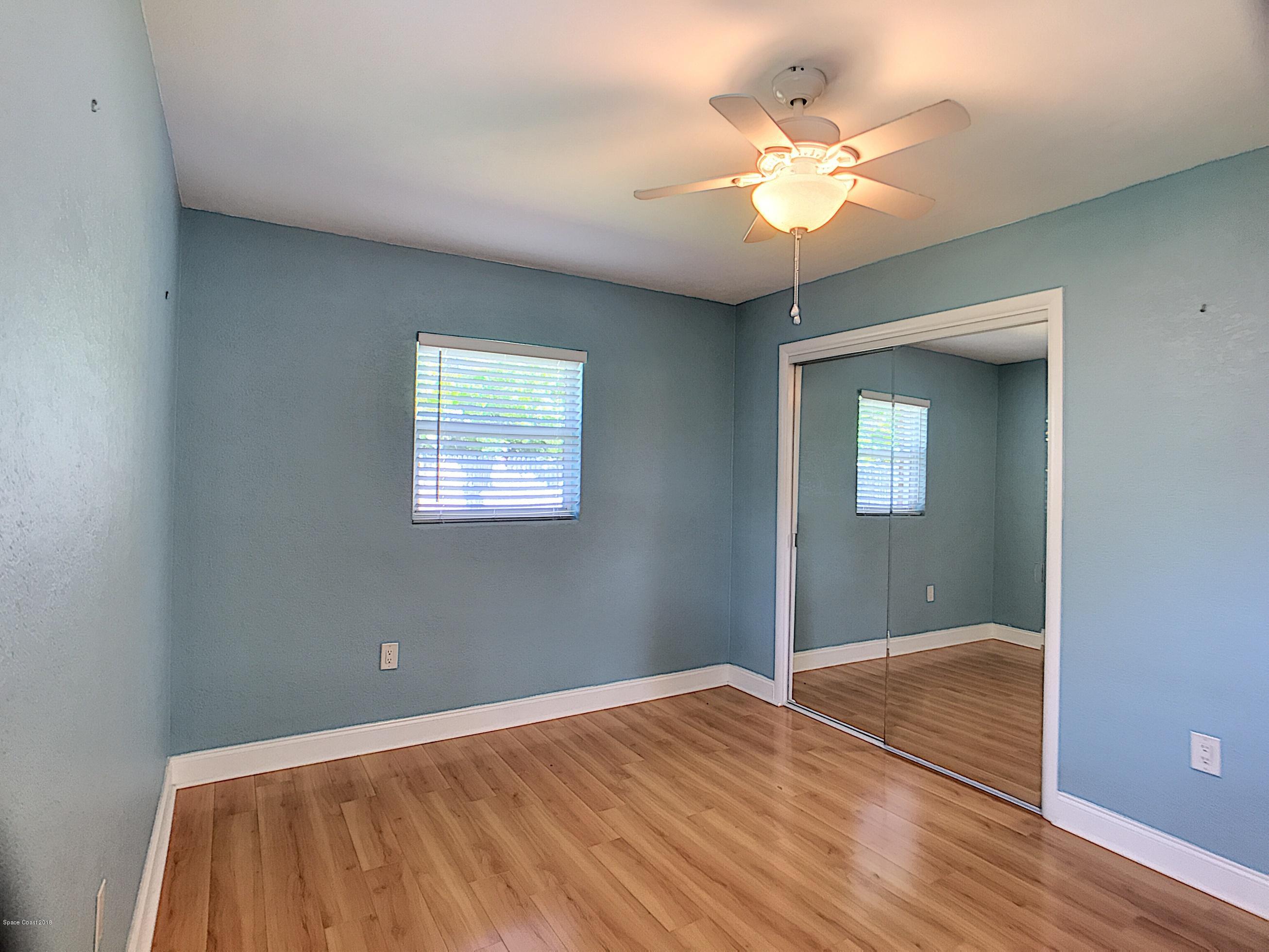 327 3rd Street Merritt Island, FL 32953 - Photo 22 of 26 a view of an empty room with a window