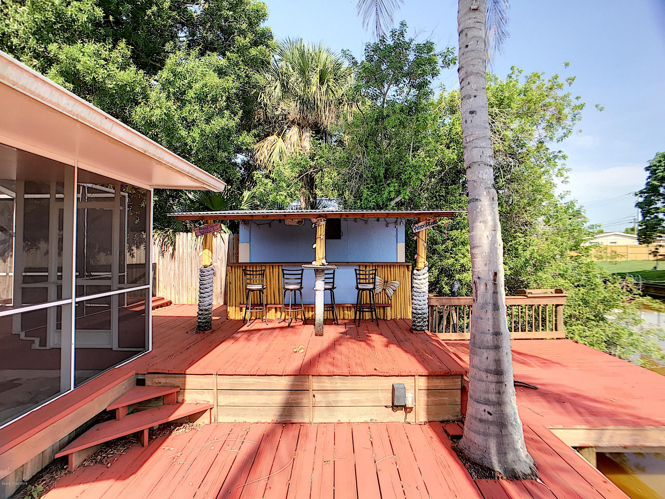 327 3rd Street Merritt Island, FL 32953 - Photo 6 of 26 a view of outdoor space yard deck and patio