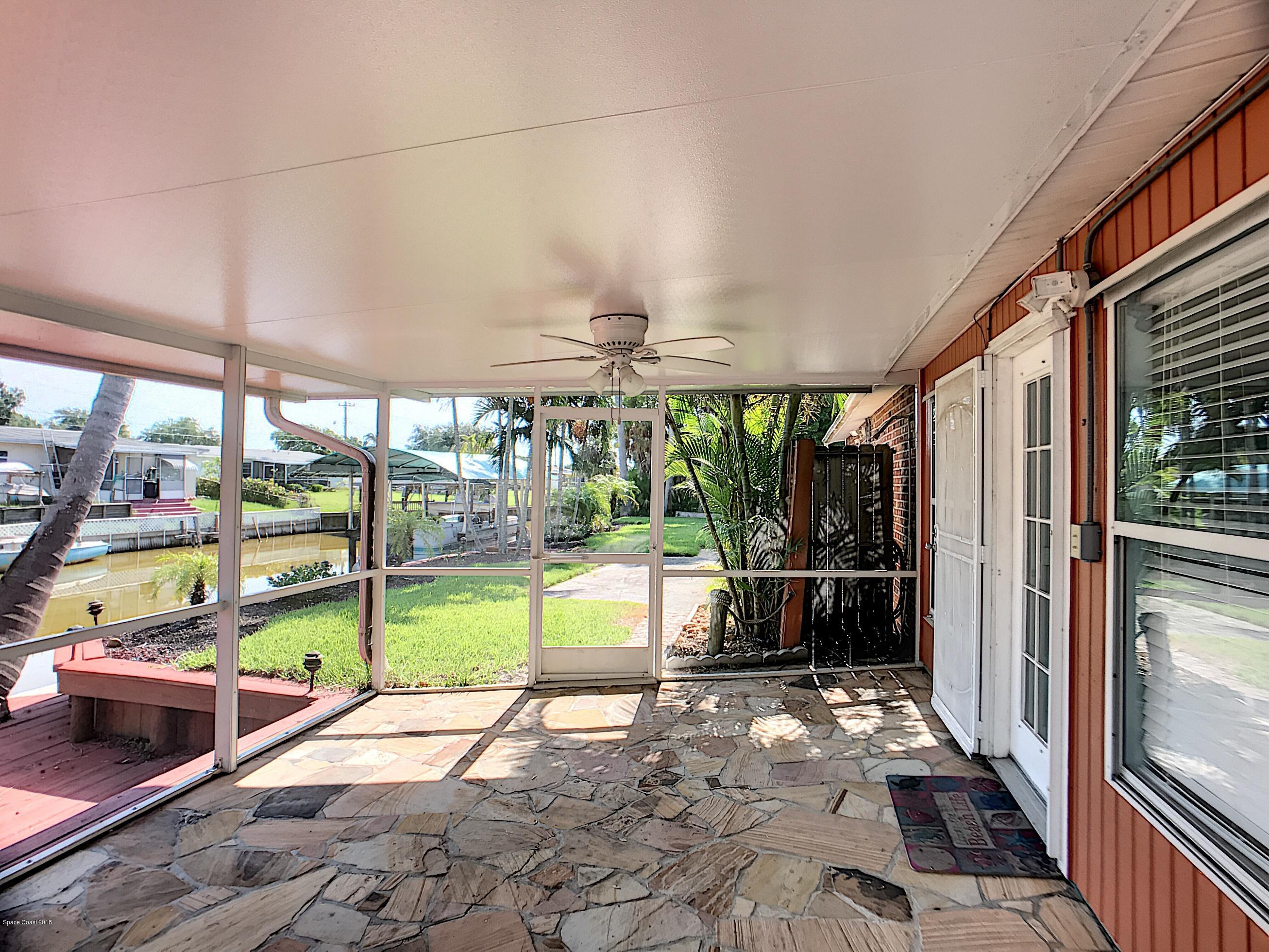 327 3rd Street Merritt Island, FL 32953 - Photo 10 of 26 a view of railway station with sitting area