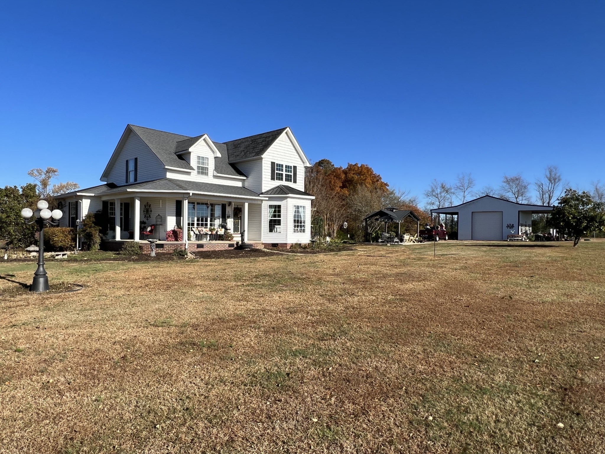 379 Revilo Road Leoma, TN 38468 - Photo 1 of 41 a front view of a house with a yard