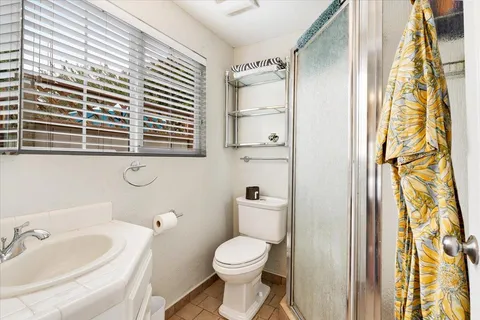 a bathroom with a sink and a toilet