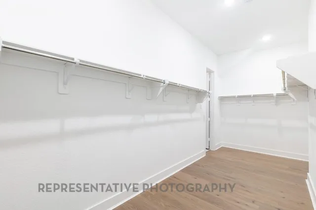 a view of a room with an empty space