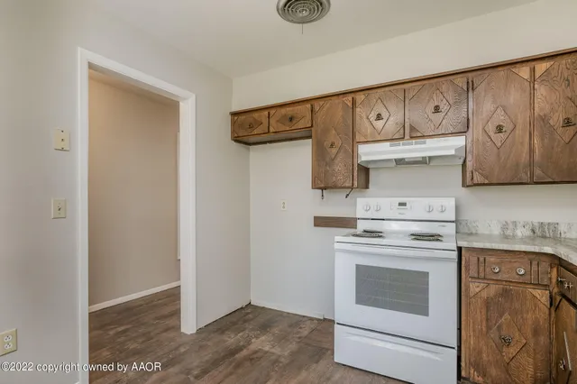 a view of a kitchen with washer and dryer
