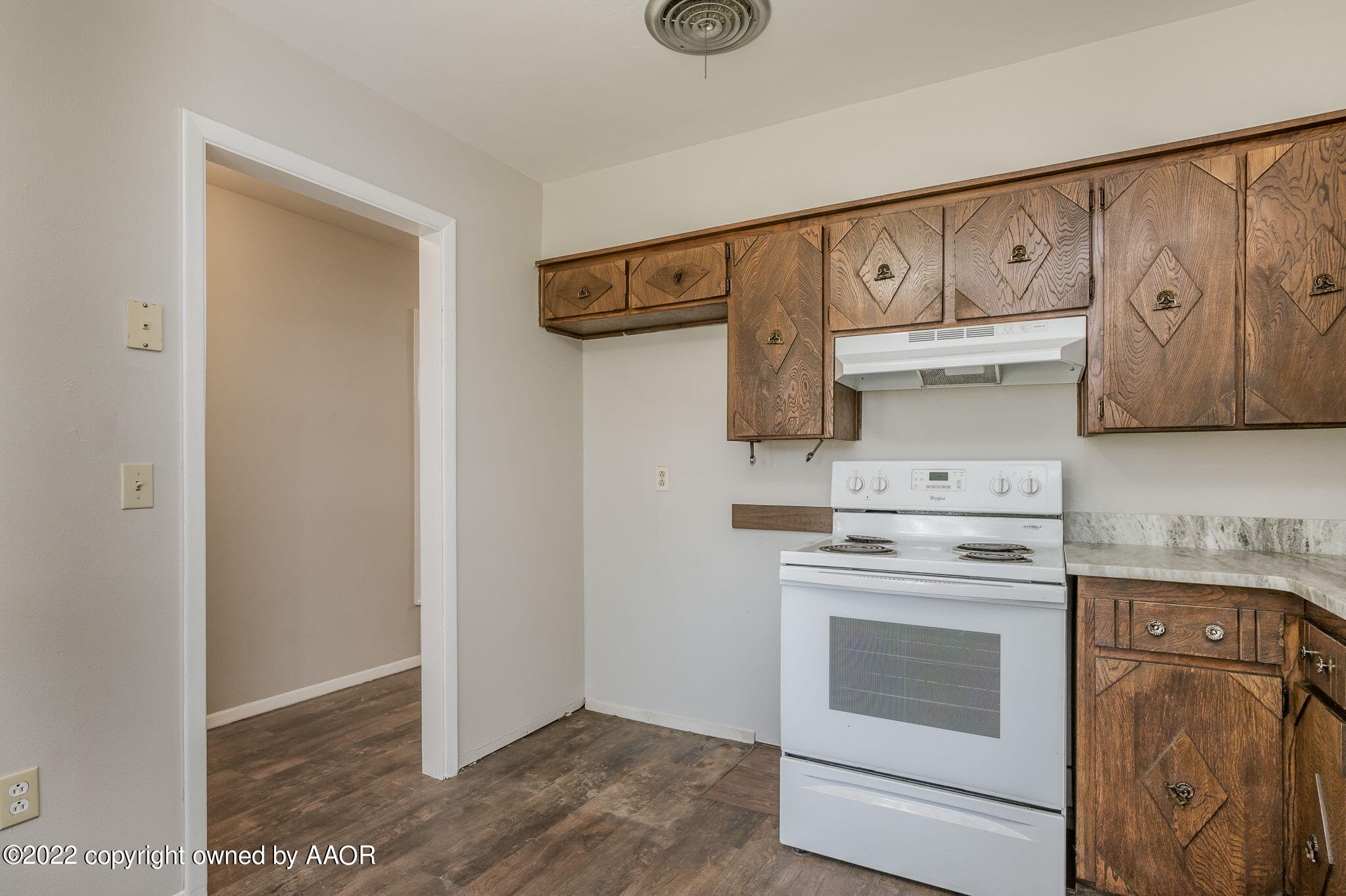 3405 Thurman Street Amarillo, TX 79109 - Photo 8 of 19 a view of a kitchen with washer and dryer