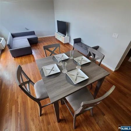 a view of a workspace with furniture