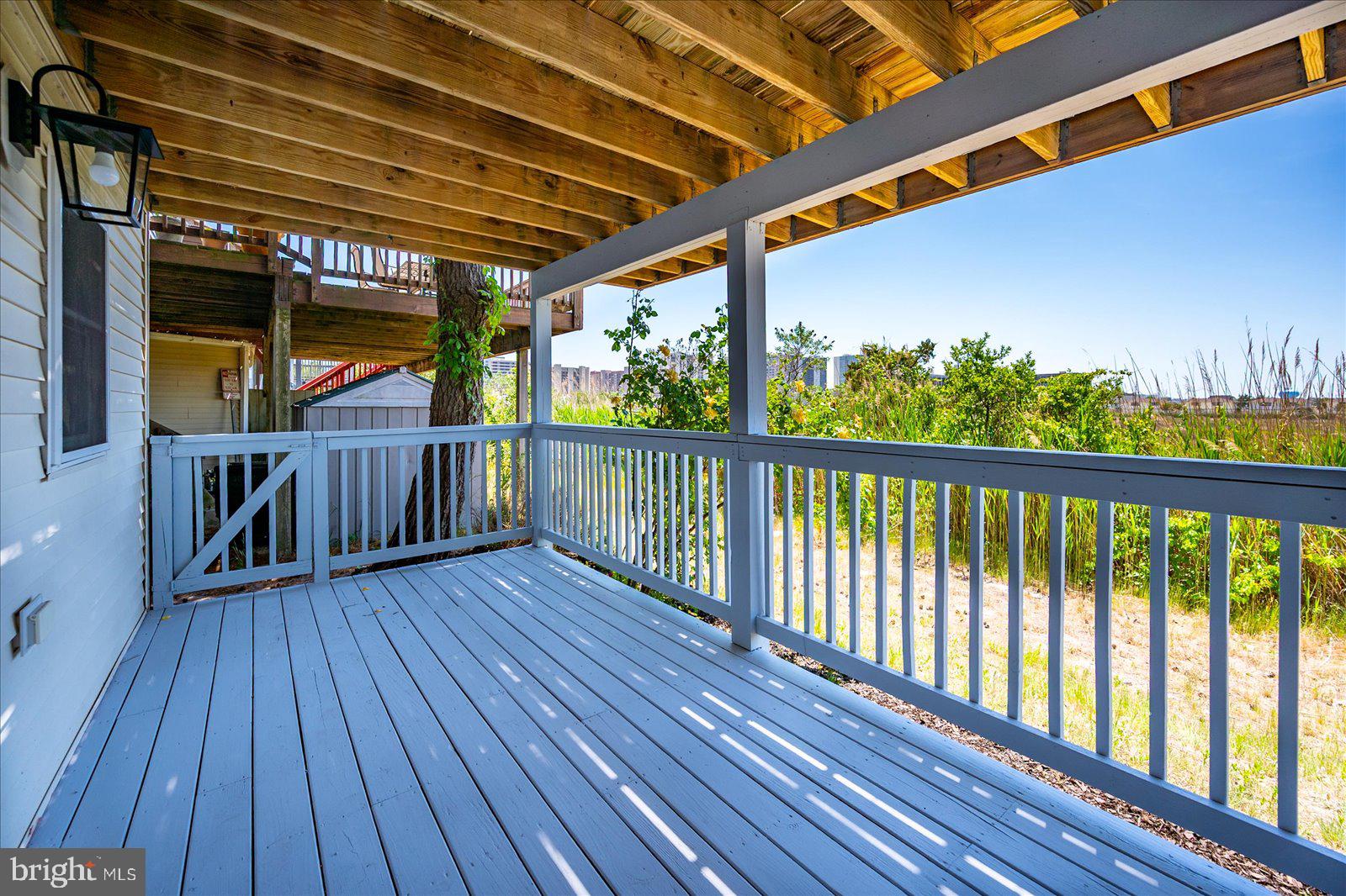 135 Jamestown Road, Unit 18A Ocean City, MD 21842 - Photo 37 of 63 a view of deck with wooden floor and outdoor space