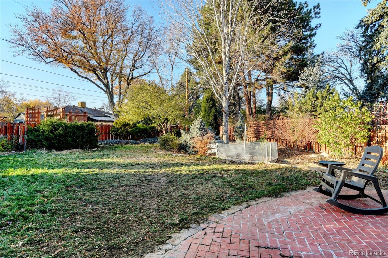 3515 Otis Street Wheat Ridge, CO 80033 - Photo 37 of 37 a view of backyard with seating and green space