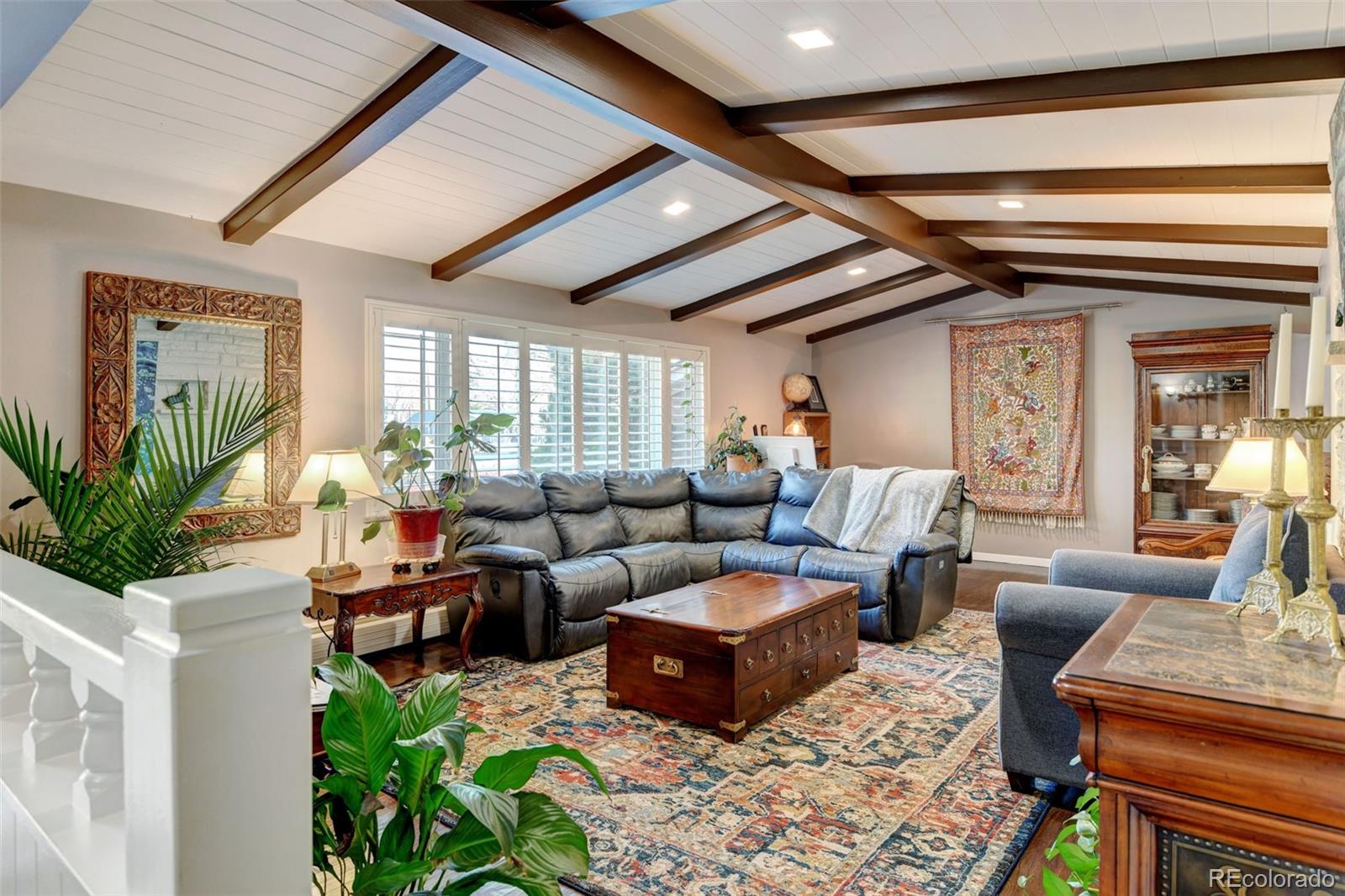 3515 Otis Street Wheat Ridge, CO 80033 - Photo 6 of 37 a living room with furniture and a large window
