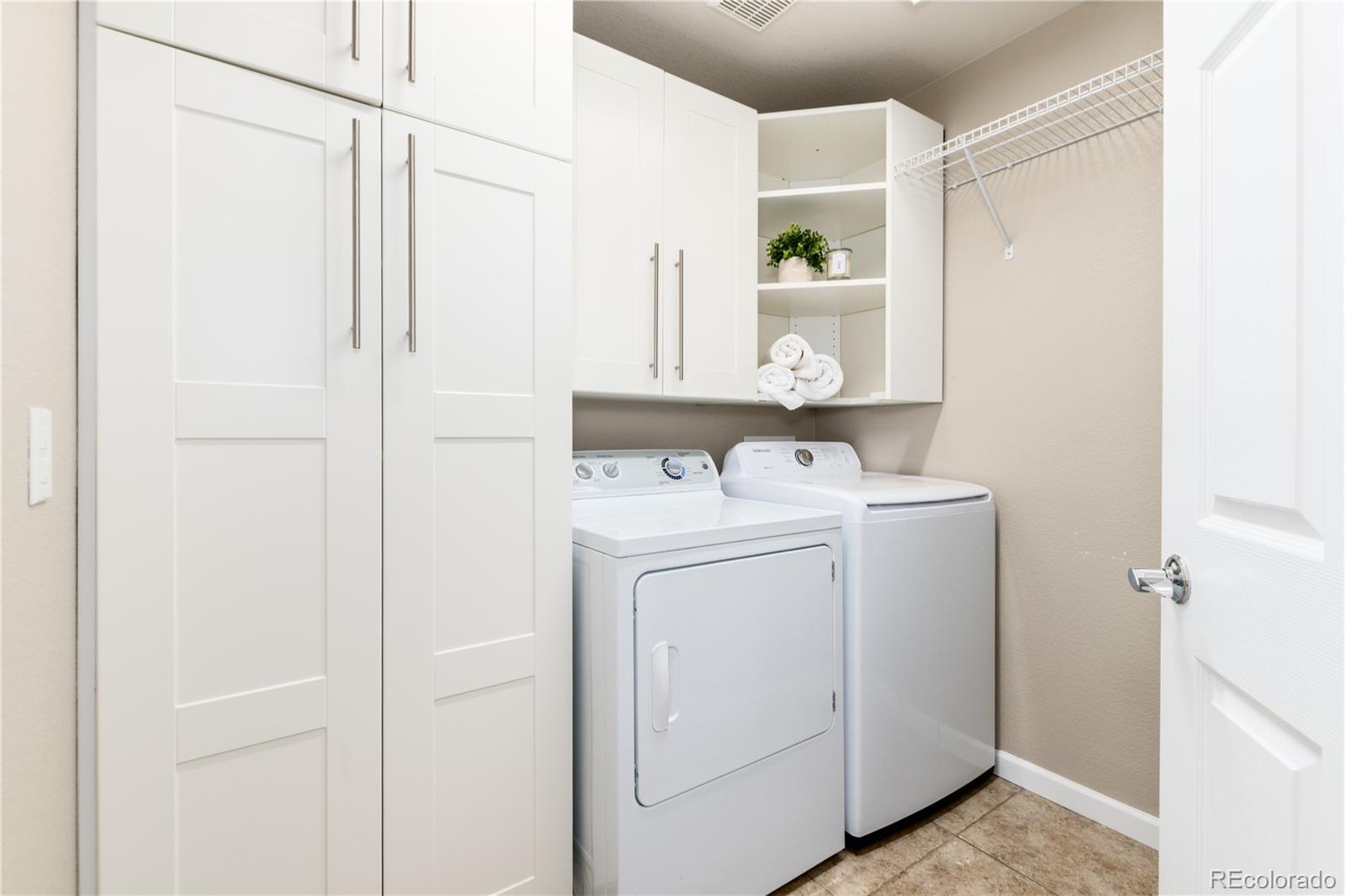 3064 Rams Horn Run Broomfield, CO 80023 - Photo 22 of 47 a utility room with dryer and washer