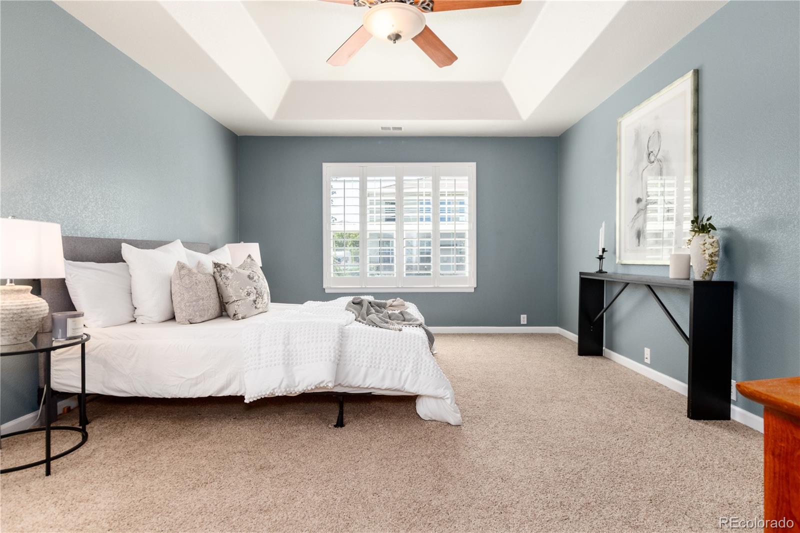 3064 Rams Horn Run Broomfield, CO 80023 - Photo 24 of 47 a bedroom with a bed and a window