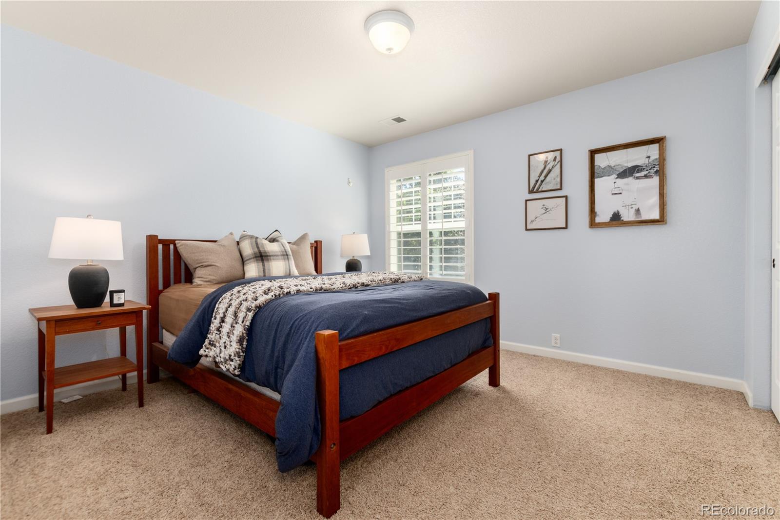 3064 Rams Horn Run Broomfield, CO 80023 - Photo 28 of 47 a bedroom with a bed and a window
