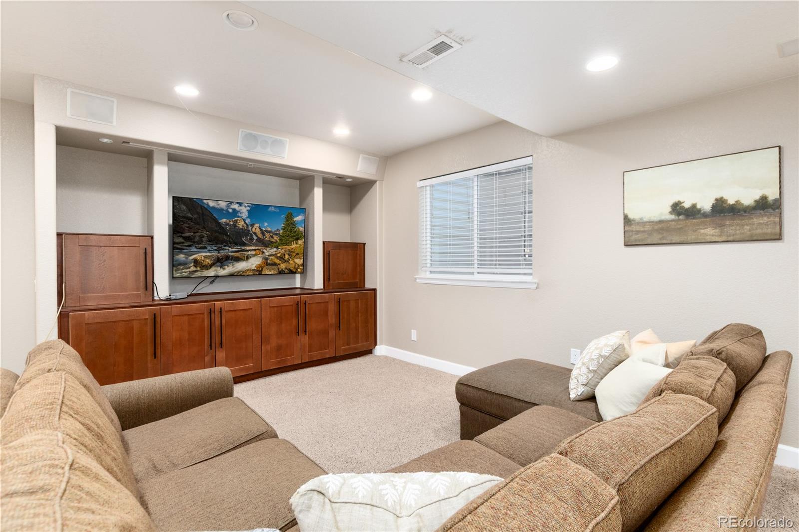 3064 Rams Horn Run Broomfield, CO 80023 - Photo 35 of 47 a living room with furniture and a window