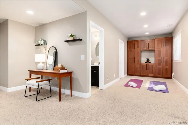 a bedroom with furniture and a window