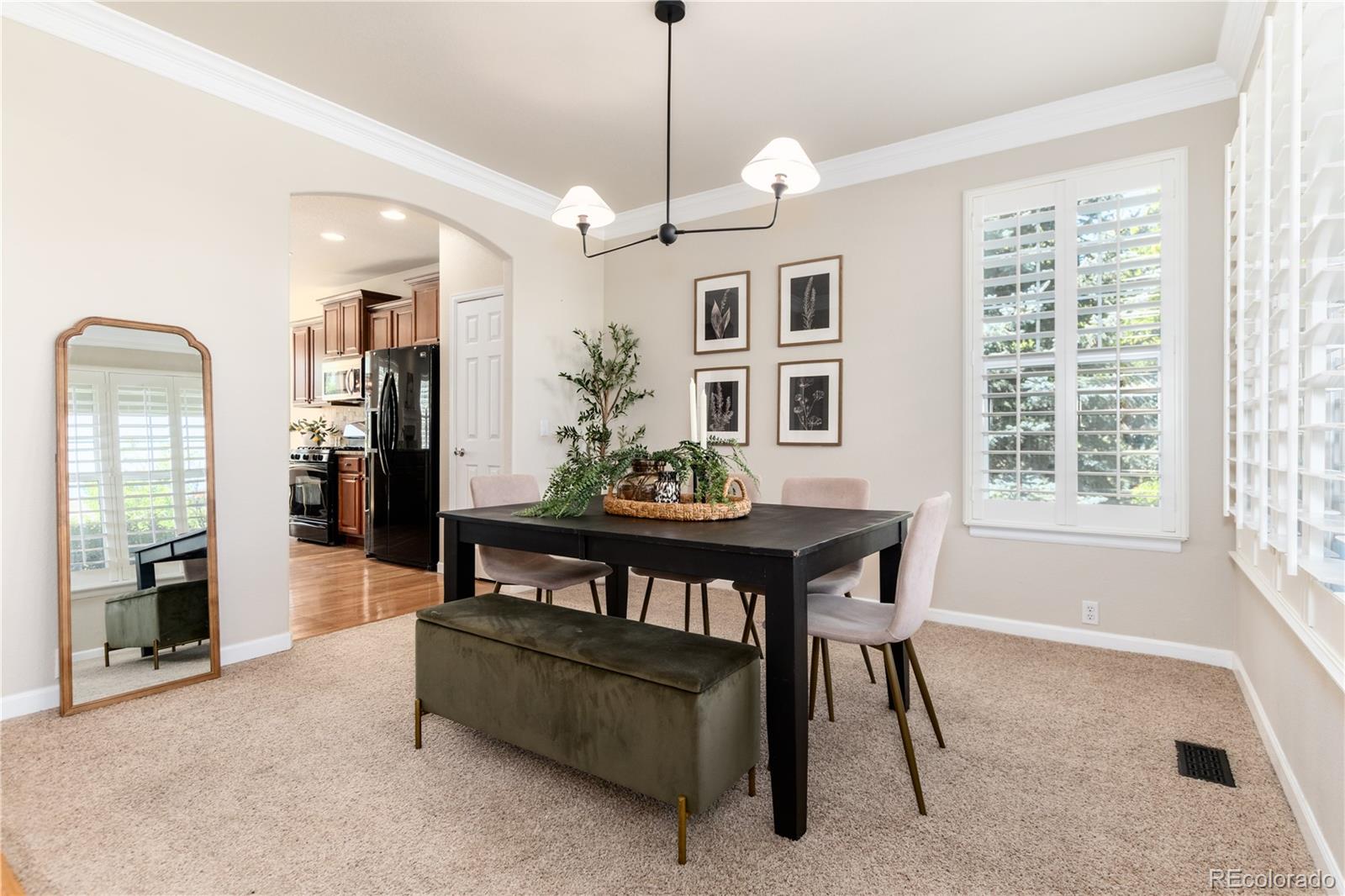 3064 Rams Horn Run Broomfield, CO 80023 - Photo 8 of 47 a dining room with furniture and window