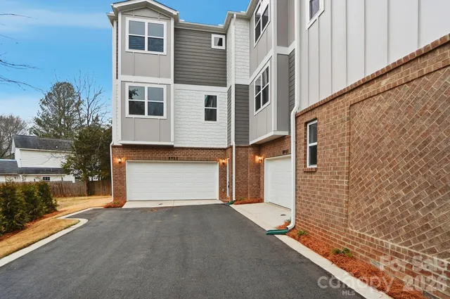 a view of a house with a street